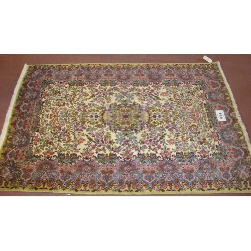 914 - A central Persian Kerman rug, very soft pastel colours, floral pattern and in good condition 184 x 1... 