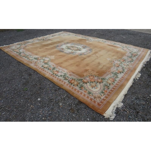 916 - A very large good quality thick pile Chinese carpet on beige ground. 480 x 360cm (approx 16'x12').
C... 