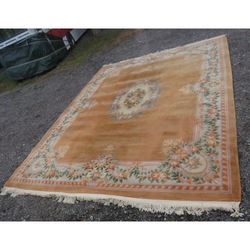 916 - A very large good quality thick pile Chinese carpet on beige ground. 480 x 360cm (approx 16'x12').
C... 