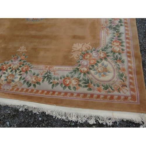 916 - A very large good quality thick pile Chinese carpet on beige ground. 480 x 360cm (approx 16'x12').
C... 