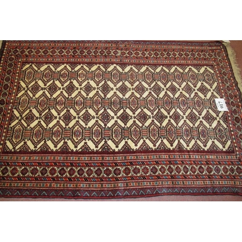 917 - North East Persian Turkoman rug, small repeat pattern on cream ground. Good clean rug. 175 x 115cm