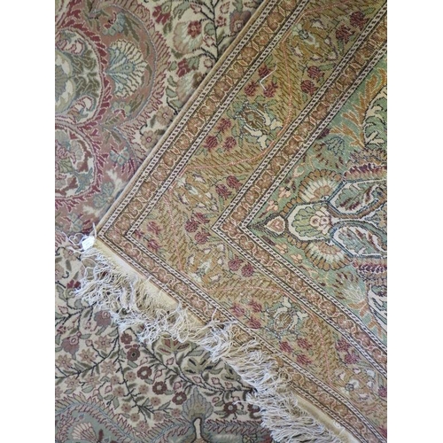 919 - A fine Persian carpet, central floral pattern on minted field, 76