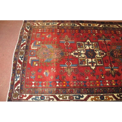 925 - A Hamadan rug, 3 central motifs, stylised insects, some colour irregularity, no damage 165cm x 118cm... 