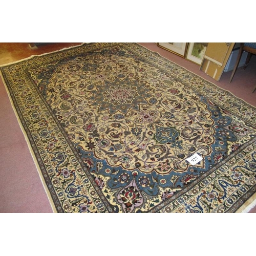 927 - A fine Persian Meshed carpet, central pattern motif, blue on cream heavy pattern and wide borders. 3... 