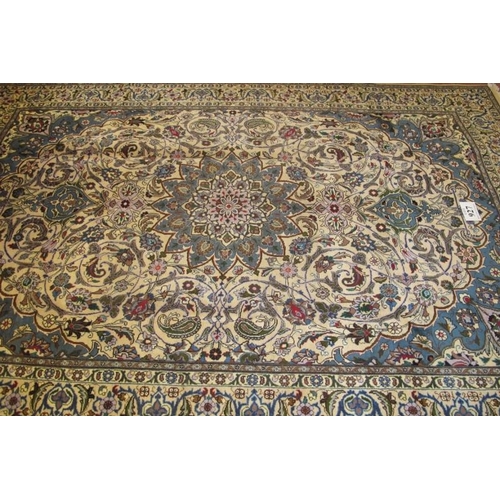 927 - A fine Persian Meshed carpet, central pattern motif, blue on cream heavy pattern and wide borders. 3... 