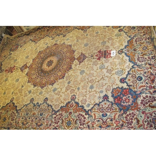 928 - An excellent Persian Meshed carpet, large central motif, set on cream ground 393cm x 272cm. Very goo... 