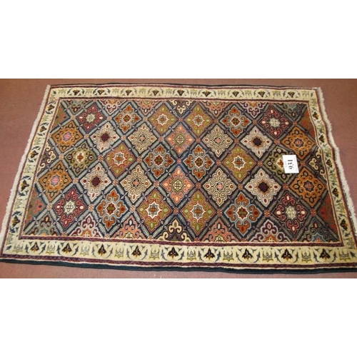 931 - A Persian Ardabil rug, with mosaic style pattern. Good colour and condition 1.64 x 1.04 metres.