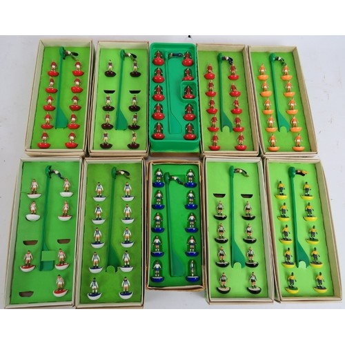 247 - A quantity of vintage Subbuteo teams, pitches and accessories including 10 teams, three pitches, goa... 