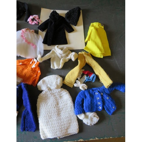 196 - A large box full of 1970s handmade Cindy Doll outfits with some patterns and two Cindy dolls, one ma... 