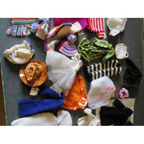 196 - A large box full of 1970s handmade Cindy Doll outfits with some patterns and two Cindy dolls, one ma... 