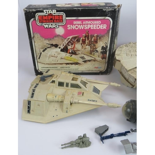 105 - A collection of vintage Star Wars toys including a boxed Palitoy Snow Speeder, a Kenner Products 197... 