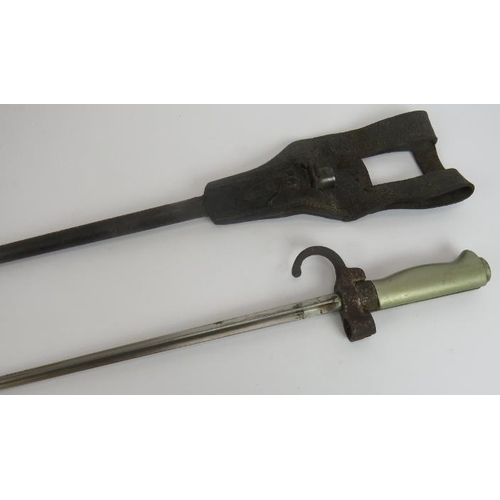 107 - A French model 1886 bayonet with scabbard and leather frog. Cruciform blade, nickel handle, steel sc... 