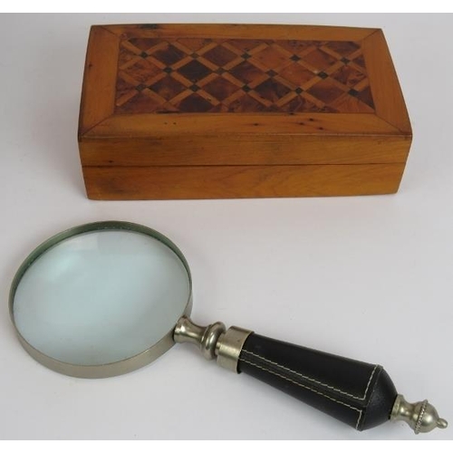 116 - A cigar humidor, an inlaid cigarette box, a leather bound magnifying glass and a vintage Ronson ligh... 