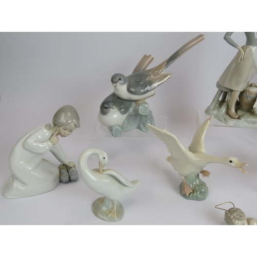 120 - 10 Lladro Spanish porcelain figurines including geese, rabbit, children and birds. Tallest 23cm. (10... 