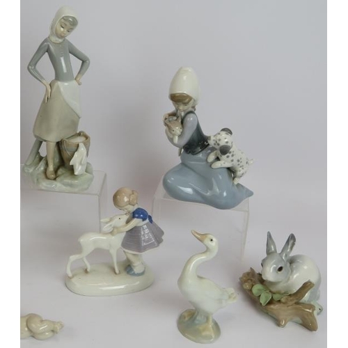 120 - 10 Lladro Spanish porcelain figurines including geese, rabbit, children and birds. Tallest 23cm. (10... 