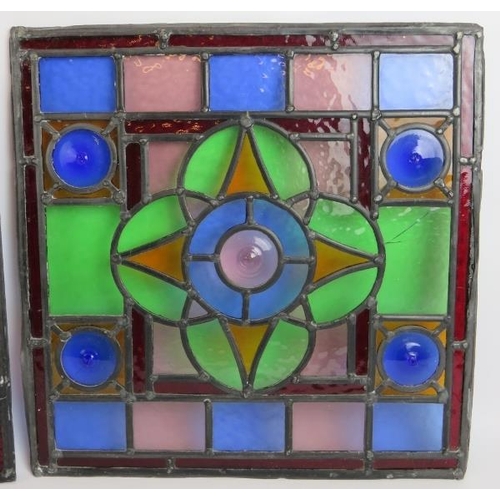 131 - Two antique stained glass panels, each with a central quatrefoil. 45cm x 45cm. (2).
Condition report... 