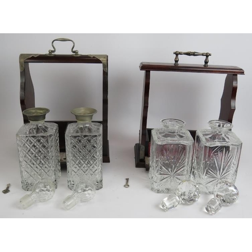 135 - An Edinburgh crystal two decanter mahogany tantalus and a similar two decanter tantalus, both with k... 