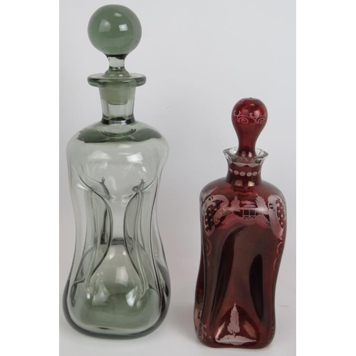 136 - A collection of mainly antique decanters including a pair of 19th century decanters, a Regency lique... 