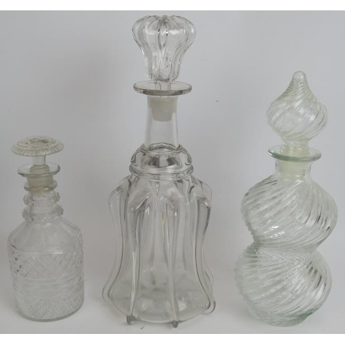 136 - A collection of mainly antique decanters including a pair of 19th century decanters, a Regency lique... 