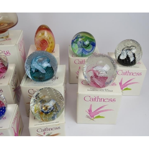 137 - A collection of 14 Caithness paperweights, all boxed with certificates, and a Caithness glass 50th g... 