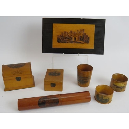 142 - A small collection of Mauchline ware including trinket boxes, napkin rings, beaker and pen holder, p... 