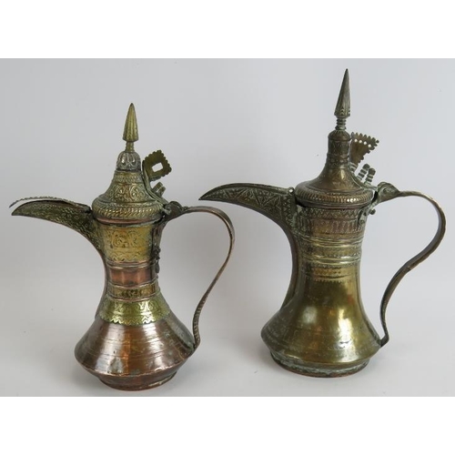 148 - Two antique copper and brass middle Eastern Dallah coffee pots, both intricately decorated. Tallest ... 