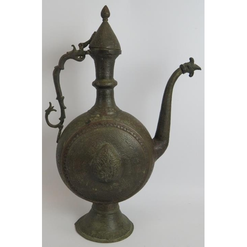 151 - A finely decorated Indian bronze ewer of large proportions. Height 54cm.
Condition report: Repair to... 