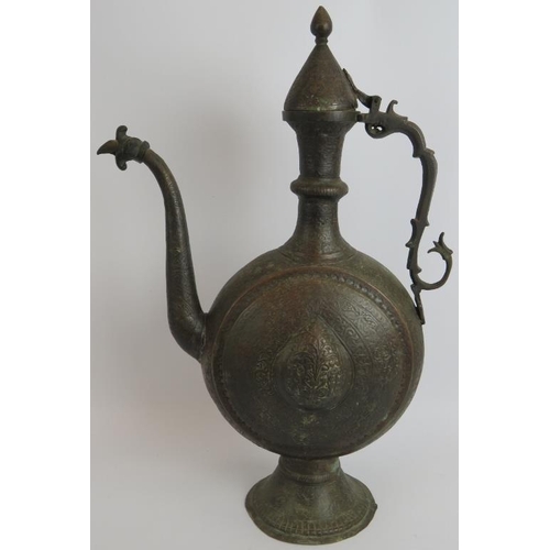 151 - A finely decorated Indian bronze ewer of large proportions. Height 54cm.
Condition report: Repair to... 