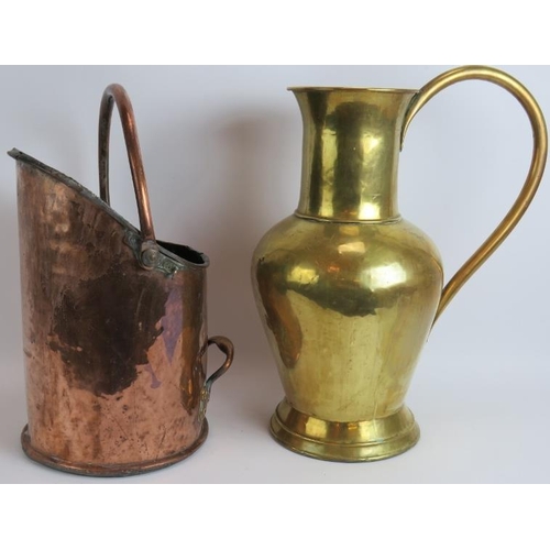 152 - An antique copper coal scuttle with rivetted handles and a large brass water jug. 50cm tall. (2).
Co... 