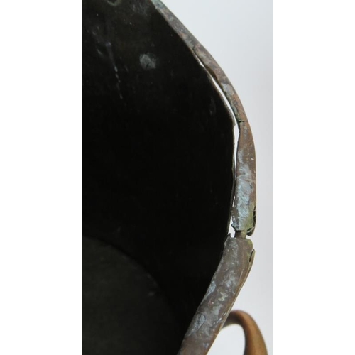 152 - An antique copper coal scuttle with rivetted handles and a large brass water jug. 50cm tall. (2).
Co... 