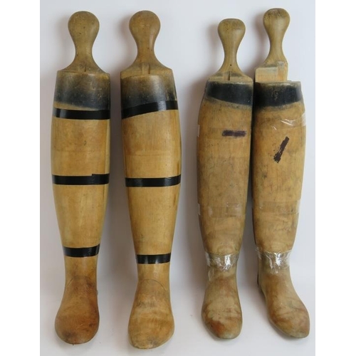 155 - Two pairs of vintage beech wood riding boot trees, one male and one female. One tree bears a label f... 