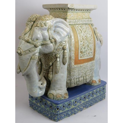 159 - A large Chinese pottery elephant plant stand with glazed decoration. Seal mark to corner. Height 54c... 