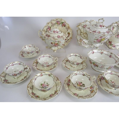 164 - An ornate antique 31 piece tea set decorated with flowers and gilt edges. (31).
Condition report: So... 