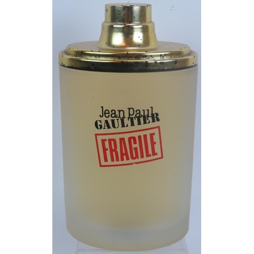 167 - A large Jean Paul Gaultier 'Fragile' display perfume bottle with contents of Eau de Toilette. Height... 