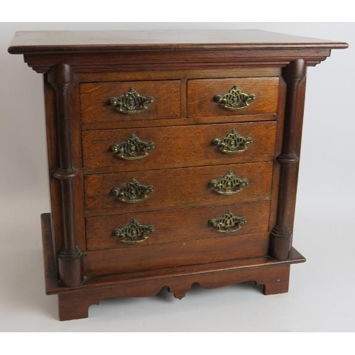 17 - A small set of antique oak drawers/collectors cabinet. Possibly an apprentice piece. Height 38cm. Wi... 