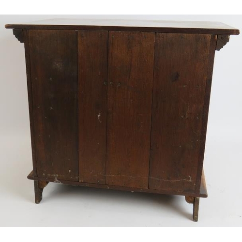 17 - A small set of antique oak drawers/collectors cabinet. Possibly an apprentice piece. Height 38cm. Wi... 