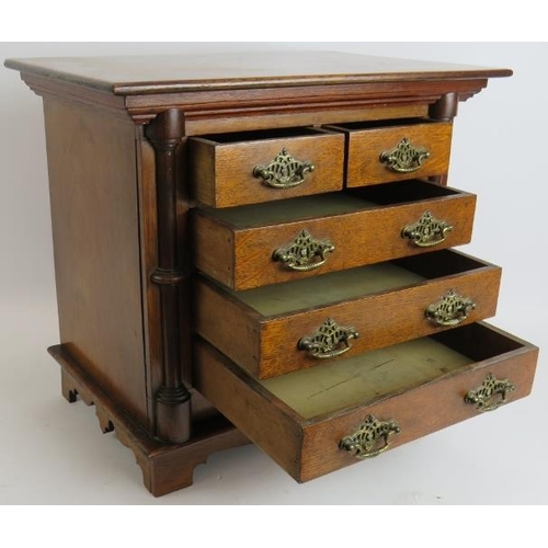 17 - A small set of antique oak drawers/collectors cabinet. Possibly an apprentice piece. Height 38cm. Wi... 