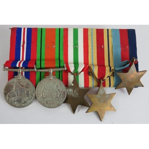 176 - A WW2 medal group on brooch bar including 1939-1945 star, African star with 8th army clasp, Italy st... 