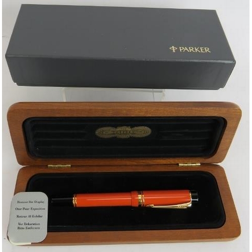 20 - A 1980s Parker Duo Fold Centennial fountain pen, brand new old stock, orange body, 18ct gold nib, Am... 