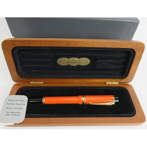 20 - A 1980s Parker Duo Fold Centennial fountain pen, brand new old stock, orange body, 18ct gold nib, Am... 