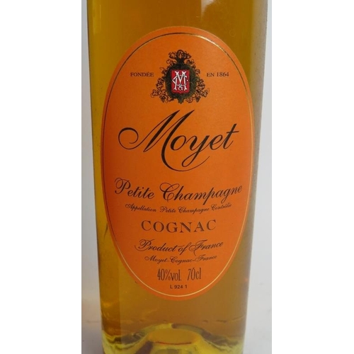 215 - One bottle of Moyet Petit Champagne Cognac in wooden presentation box, 70cl 40% vol.
Condition repor... 