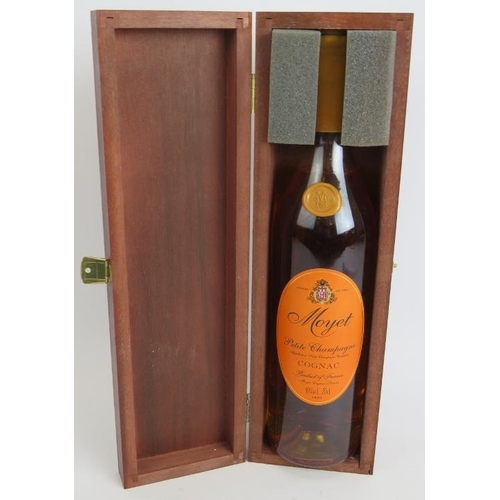 215 - One bottle of Moyet Petit Champagne Cognac in wooden presentation box, 70cl 40% vol.
Condition repor... 