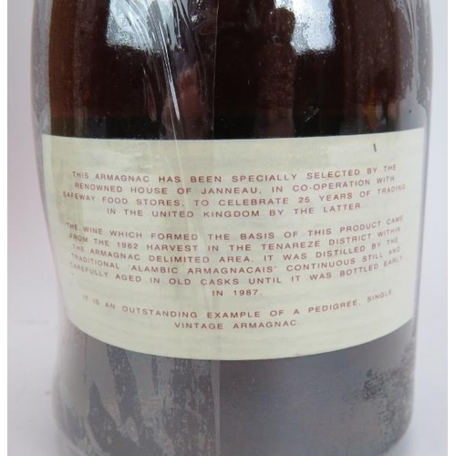 216 - A bottle of Janneau Grande Armagnac Brandy vintage 1962, bottle No 52, bottled 1987 to celebrate Saf... 