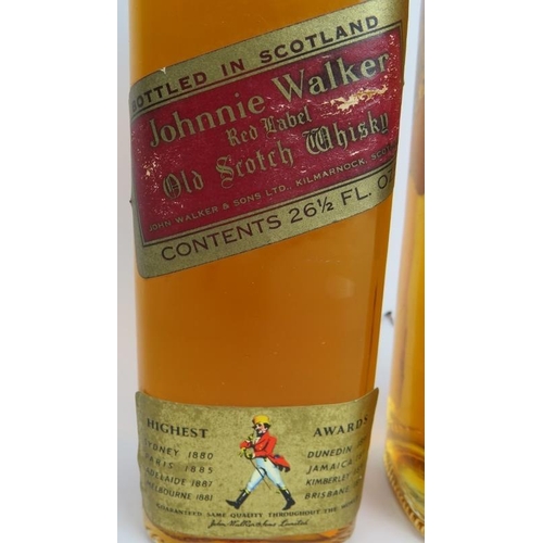 217 - Two bottles of 1960s Johnnie Walker Red Label old Scotch Whisky, 26.5 floz. (2).
Condition report: O... 