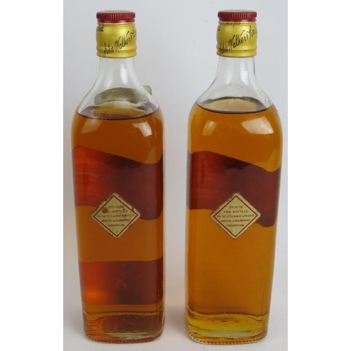 217 - Two bottles of 1960s Johnnie Walker Red Label old Scotch Whisky, 26.5 floz. (2).
Condition report: O... 