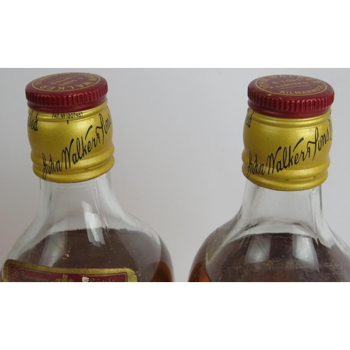 217 - Two bottles of 1960s Johnnie Walker Red Label old Scotch Whisky, 26.5 floz. (2).
Condition report: O... 