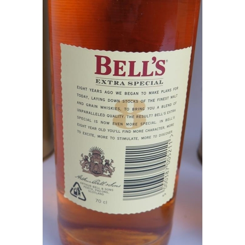 218 - Four bottles of Bells 8 year old Scotch Whisky in presentation tins. 70cl 40% vol. (4).
Condition re... 