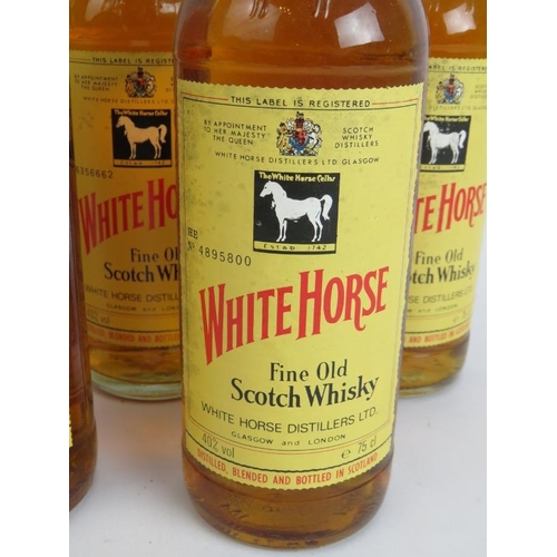 220 - Five bottles of 1980s White Horse fine old Scotch Whisky, 75cl 40% vol. (5).
Condition report: Some ... 