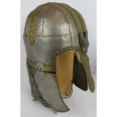 243 - A replica steel English civil war lobster tailed helmet and a similar chain mail backed Viking helme... 