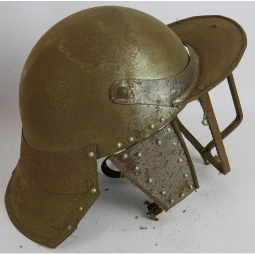 243 - A replica steel English civil war lobster tailed helmet and a similar chain mail backed Viking helme... 